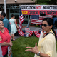People talk before the start of a rally against “critical race theory” (CRT) being taught in schools at the Loudoun County Government center in Leesburg, Virginia on June 12, 2021. Several states, including Tennessee, have outlawed teaching CRT in schools despite the fact that almost no public school does.